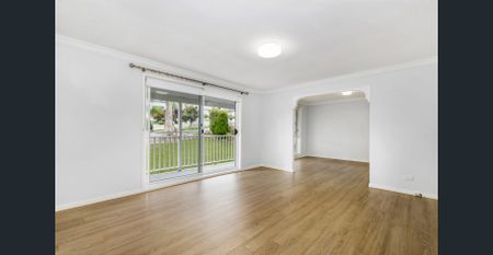 A GREAT FAMILY HOME - Lawn Maintenance Included - Photo 5