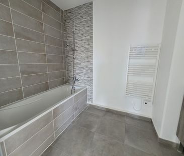 Location Appartement 3 pièces 59m² NIMES 30000 - Photo 1