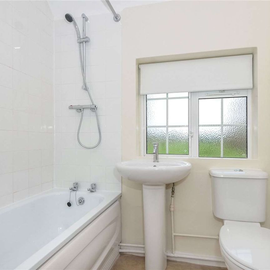 A three bedroom semi detached family home overlooking open fields. - Photo 1