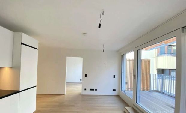 Pauschalmiete inklusive Warmwasser & Heizung/Kühlung - Moderne 2-Zimmer-Wohnung mit schöner Terrasse in den Hof - Stilvolle Ausstattung - Foto 1