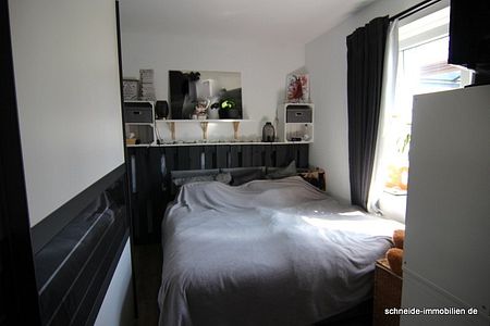 Attraktive 2-Zimmer-Erdgeschoss-Wohnung mit Terrasse und Gartenanteil - Foto 2