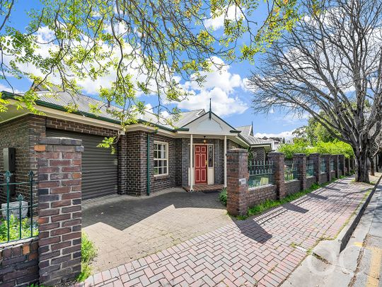 Open the Door to Effortless Family Living on Olive - Photo 1