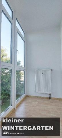 Helle 2 Raum Wohnung mit Laminat und Wintergarten - Foto 2