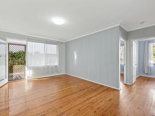 This well presented and charming two bedroom oasis showcases both practicality and comfort through modern additions and a blue ribbon location! - Photo 1