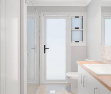 Brand New | Premium Living in the Heart of Newtown - Photo 2