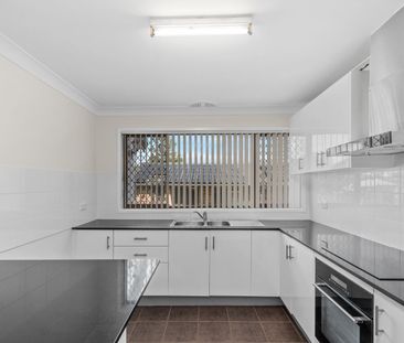 Updated 2-Bedroom Unit in Prime Position - Photo 3