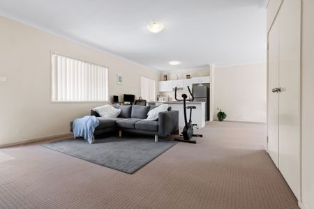 Nestled in a peaceful complex, this delightful two-bedroom unit offers comfort and convenience - Photo 3