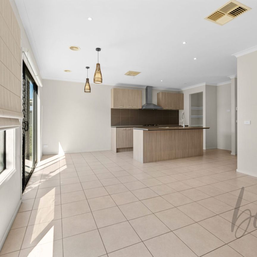 Charming 3-Bedroom, 2-Bathroom Home with Low-Maintenance Yard and Modern Amenities for Rent! - Photo 1