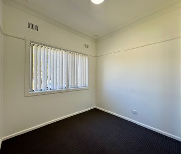 MODERN FAMILY HOME WITH MULTIPLE LIVING SPACES! - Photo 4