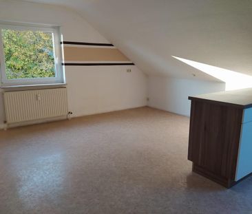 Großzügige DG-Wohnung mit Balkon und Garage in gepflegtem 3-Familienhaus - Foto 4