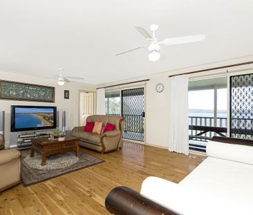 FULLY FURNISHED HOME WITH SPECTACULAR LAKE VIEWS - Photo 2