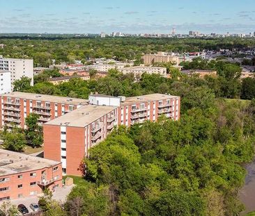 Seine River Gardens | 41 Clayton Drive, Winnipeg - Photo 1