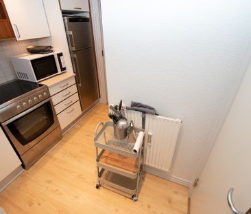 Lys lejlighed med moderne køkken og hyggelig gårdhave - Foto 6