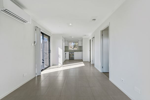 "MODERN AND LOW MAINTENANCE" - Photo 1