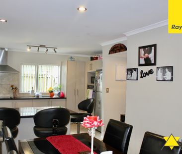 This immaculate four bedroom home is both private and welcoming and... - Photo 1
