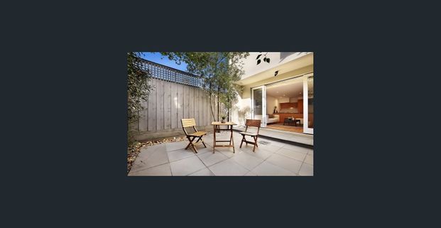 Stylish Two Storey Townhouse in Prime Location - Photo 1