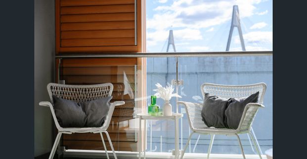 Sleek North West facing two level apartment - Photo 1