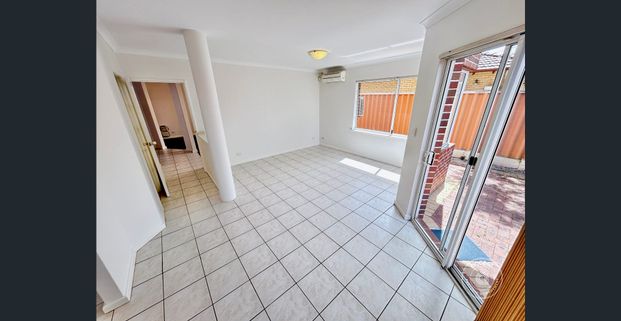 Spacious Three-Bedroom Townhouse with Convenient City Access - Photo 1