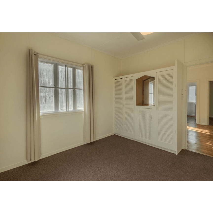 Charming High-Set Queenslander Offering Comfortable Family Living - Photo 1