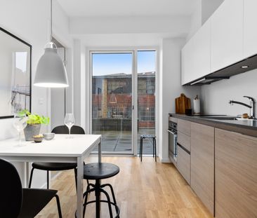 FLOT 3-VÆRELSES I SMILETS BY MED UDGANG TIL STOR FÆLLES TAGTERRASSE - Photo 6