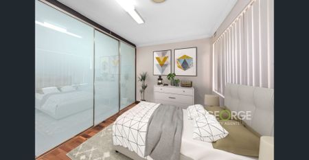 Spacious Apartment Overlooking the Park - Photo 2