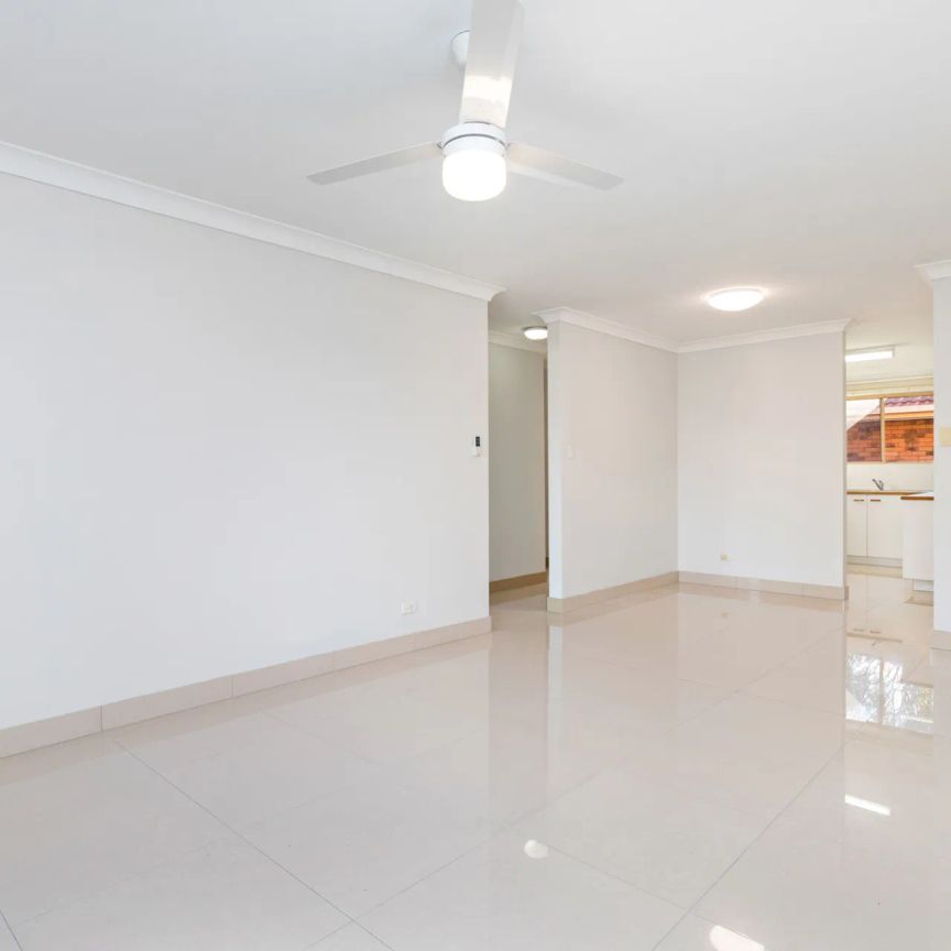 Inner-City Convenience with Spacious Living & Balcony Retreat - Photo 1