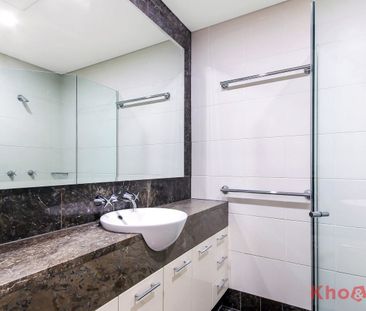 Peaceful Studio Living in Prestigious Watermark Complex - Photo 1