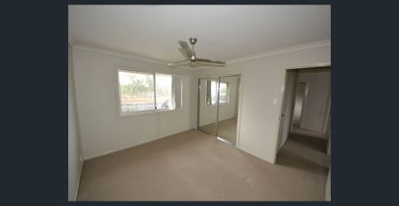 Spacious 4-Bedroom Family Home! - Photo 4