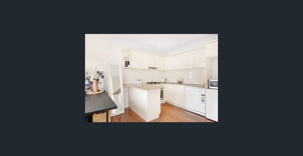 Freshly Painted 2-Bedroom Townhouse in a Prime Coastal Location - Photo 1