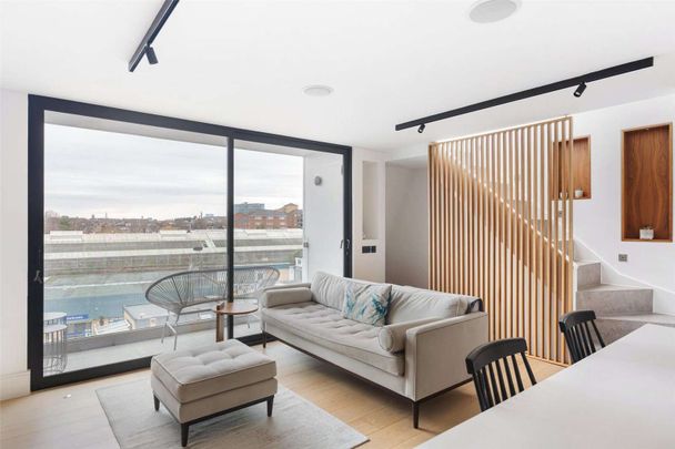 A stunning highly designed two bedroom apartment. - Photo 1