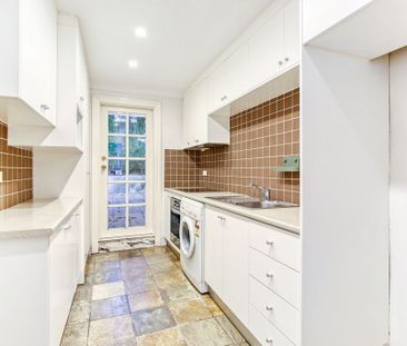 Conveniently Situated, Sun-Kissed and Spacious Two Bedroom Family H... - Photo 3