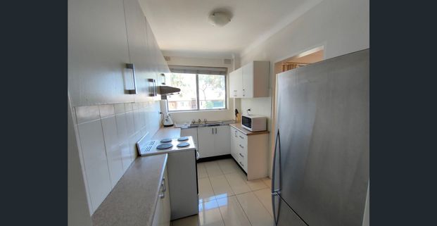 Comfort and Convenience: Fully Furnished Renovated 2-Bedroom Apartment - Photo 1