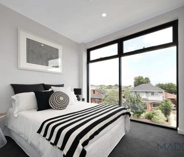 Modern Living in the McKinnon Secondary Zone - Photo 1