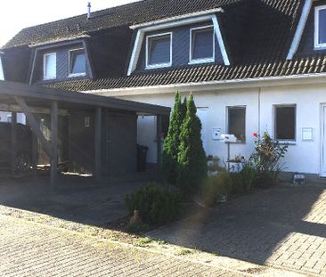 Reihenmittelhaus mit kleinem Grundstück und Carport in Holthusen - Foto 6