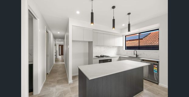 Brand New Duplex Showcasing Modern Elegance & Family Functionality - Photo 1