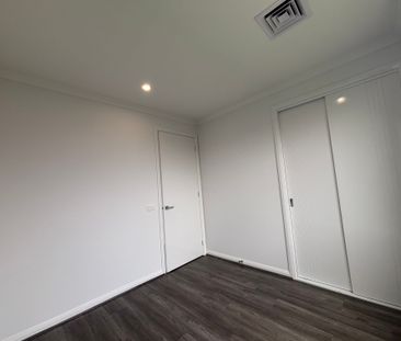 Space, Style & Security: Your Ideal Family Home Awaits - Photo 1