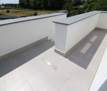 Gunstig gelegen, vernieuwd app. met 3 slpk., 2 badk. en garage te R... - Photo 2
