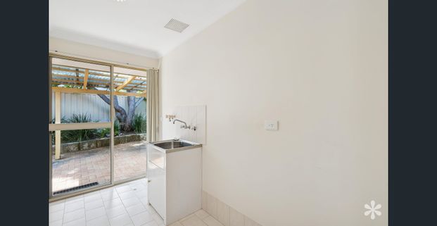 Low Maintenance Living In Prime Location - Photo 1