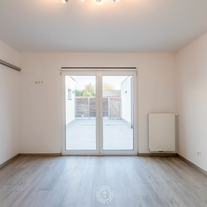 Ruim en energiezuinig gelijkvloers appartement op wandelafstand van de Schelde - Photo 1