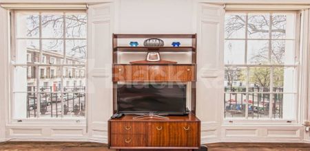 Fantastic two bed set within a period house in Zone 1 - Photo 4