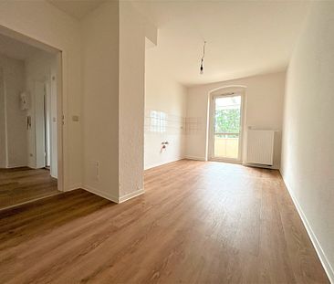 Wohntraum im Dachgeschoss mit Balkon! - Foto 2