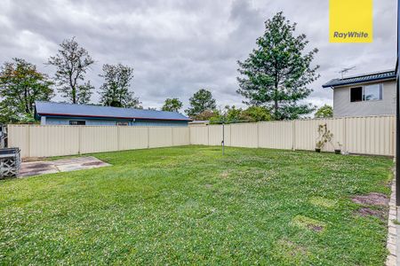 High Set Family Home in Great Location! - Photo 4