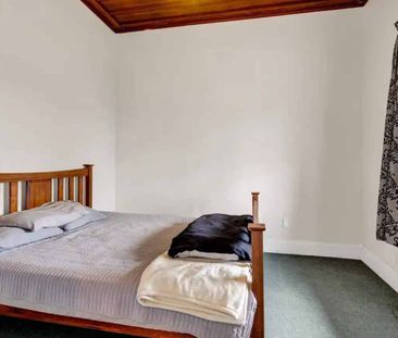Tidy 3-Bedroom Home with Large Covered Deck - Photo 2