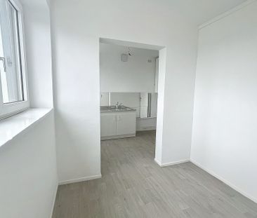 Appartement T4 rénové avec cave - Photo 5