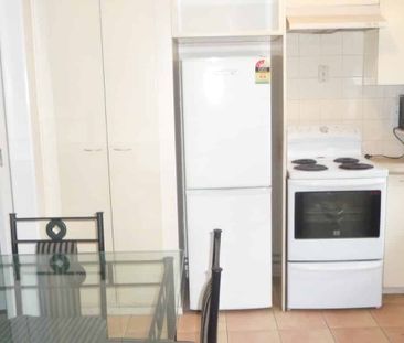 Fully Furnitured one bedroom unit with a carport - Photo 3