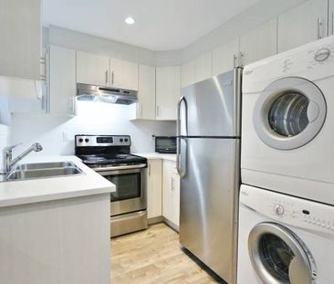 MODERN and very spacious 2 bedroom suite - utilities included! - Photo 1