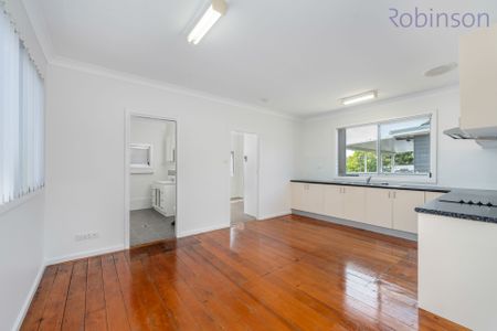 Freshly painted three bedroom home with air-conditioned living space and off street parking. - Photo 5