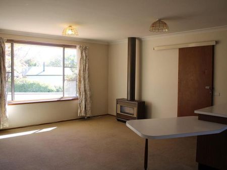 Tidy Two-Bedroom Unit in Peaceful Location - Photo 2