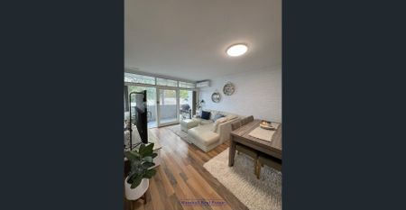 Modern Coastal Living- Spacious Top Floor 2 x 1 - Photo 3