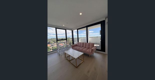 Experience luxurious living at Promenade - Photo 1